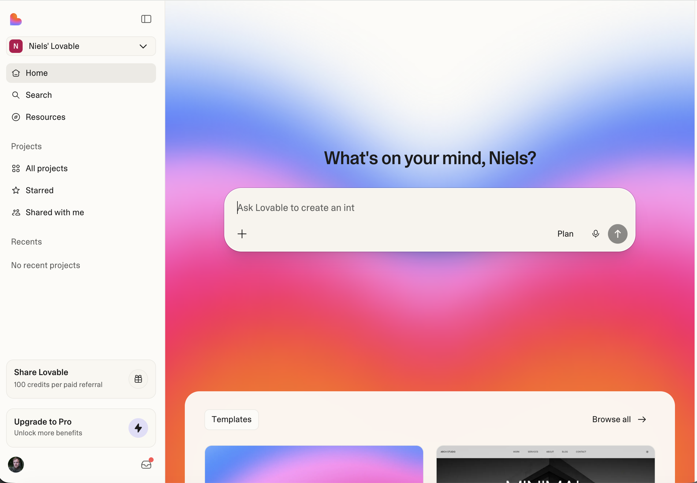 Lovable interface showing a website being built from a text prompt with visual editing controls